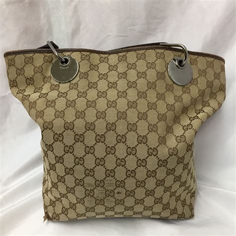 gucci 120836|120836 GG Canvas Tote Brown .